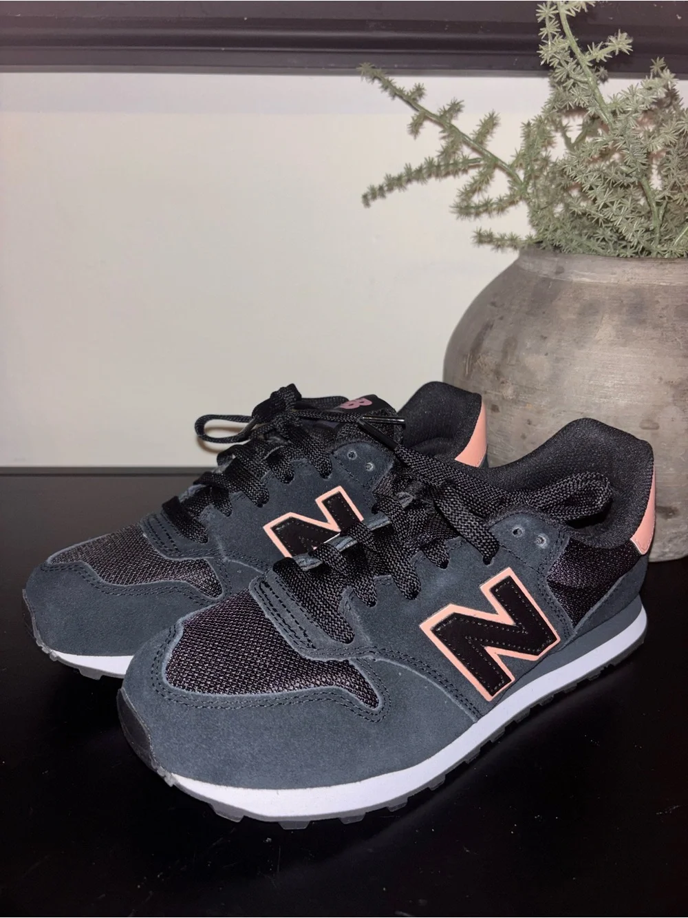 New Balance Black Sneakers with Pink Accents